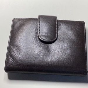 Buxton wallet with extra credit card slots.  Dark brown.